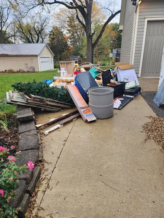 Dumpster being loaded with debris for 30 Yard Dumpster Rental in Lincolnton